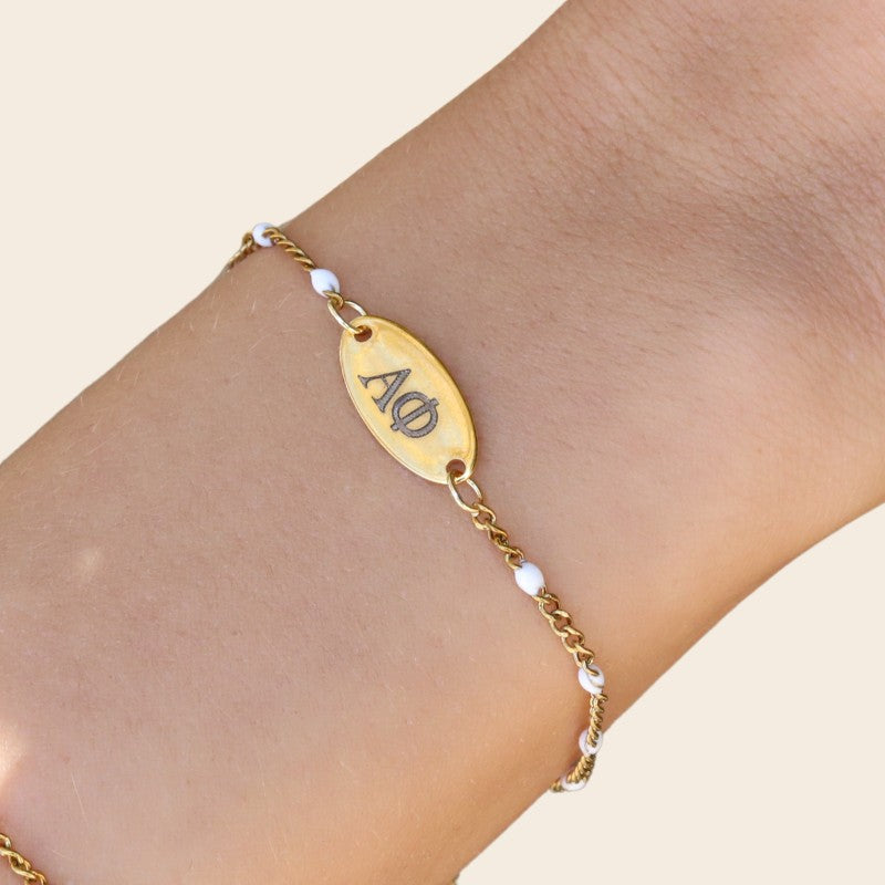 Alpha Phi Sorority Bracelet – White Enamel Gold-Plated Chain Style, Modeled on Hand