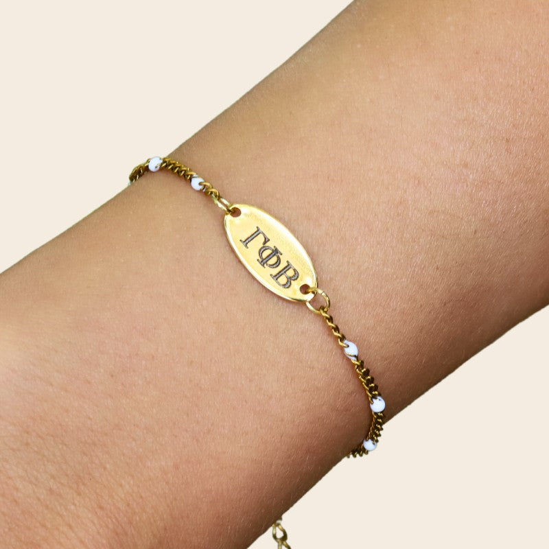 Gamma Phi Beta Sorority Bracelet – White Enamel Gold-Plated Chain Style, Modeled on Hand