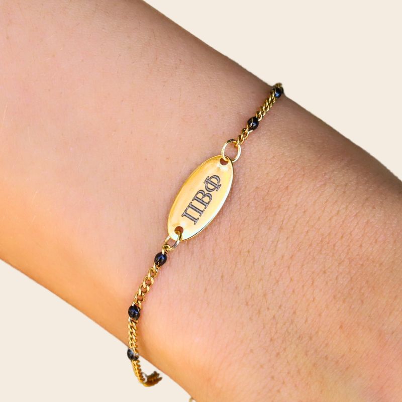 Pi Beta Phi Sorority Bracelet – Black Enamel Gold-Plated Chain Style, Modeled on Hand