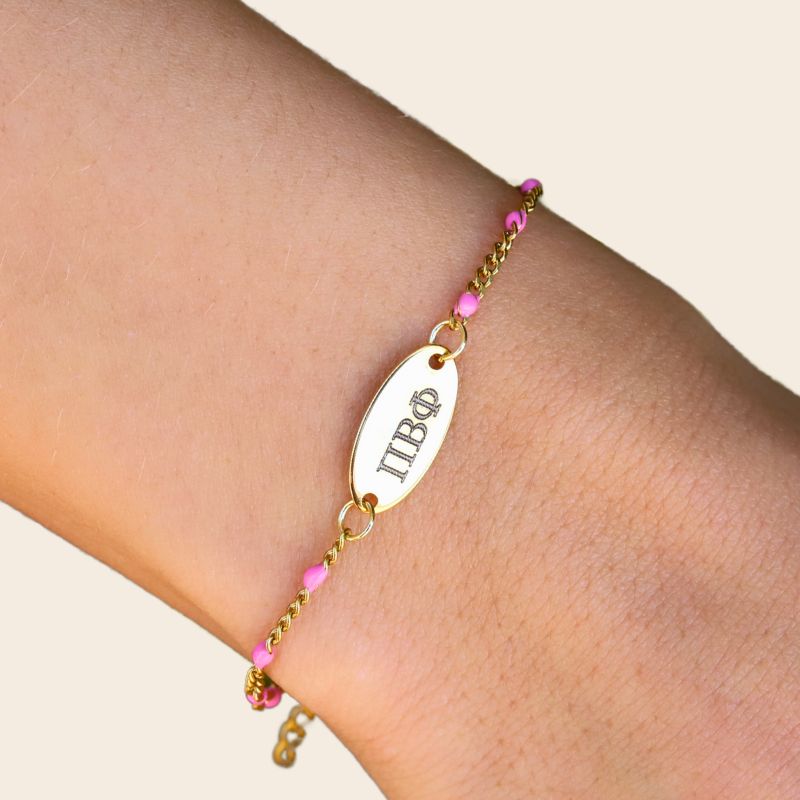 Pi Beta Phi Sorority Bracelet – Pink Enamel Gold-Plated Chain Style, Modeled on Hand