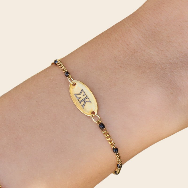 Sigma Kappa Sorority Bracelet – Black Enamel Gold-Plated Chain Style, Modeled on Hand